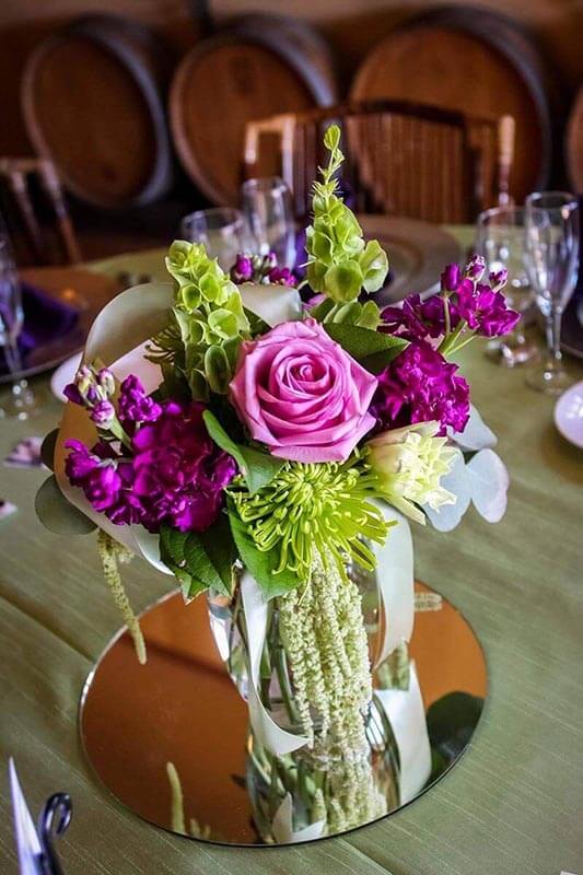 floral arrangement on acrylic mirror