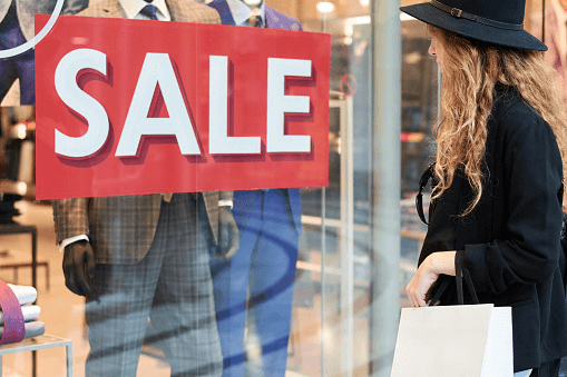 woman looking at retail signage