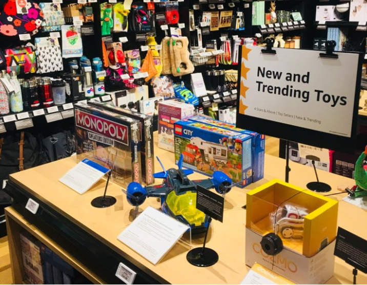 Toy and game display with a "New and Trending Toys" sign.