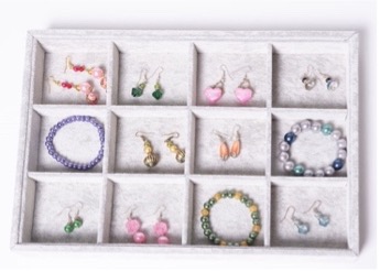 Jewelry display case with 12 sections.