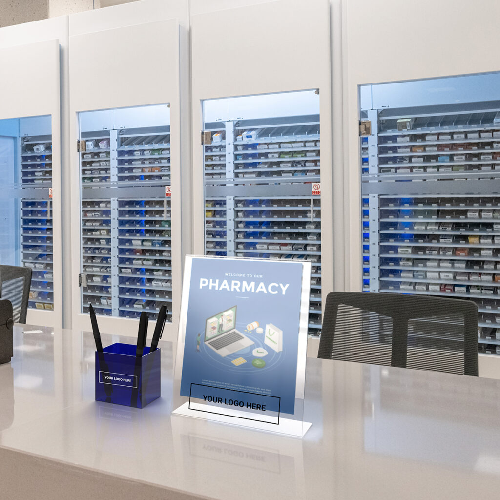 Pharmacy counter with a flyer display sign and square pen holder.