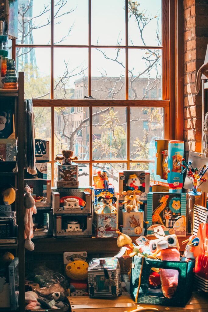 toy store display with window with sunset in background