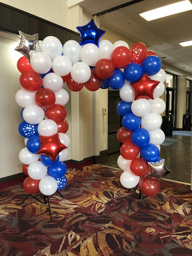 Red, white and blue balloon arch for a patriotic Memorial Day display