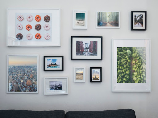 Clean acrylic picture frames hanging on a wall