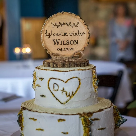  Personalized wedding cake topper made out of etched wood