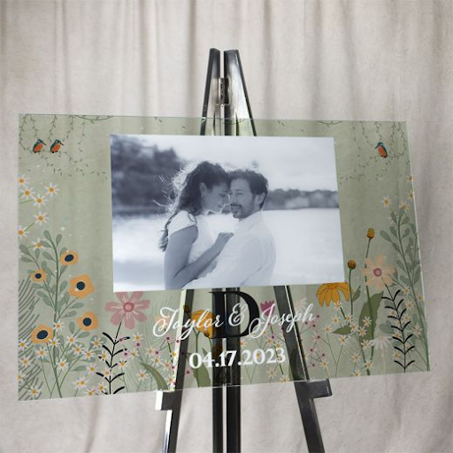 Personalized wedding welcome sign with a photo of the couple.