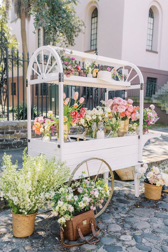 A flower display cart creates a scene with a story for your backyard 