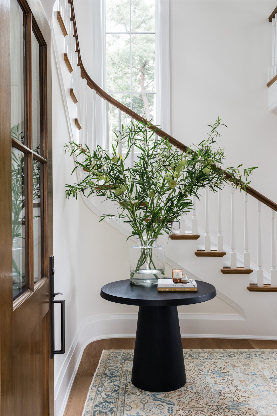 placing plants in an entryway will bring brightness and color